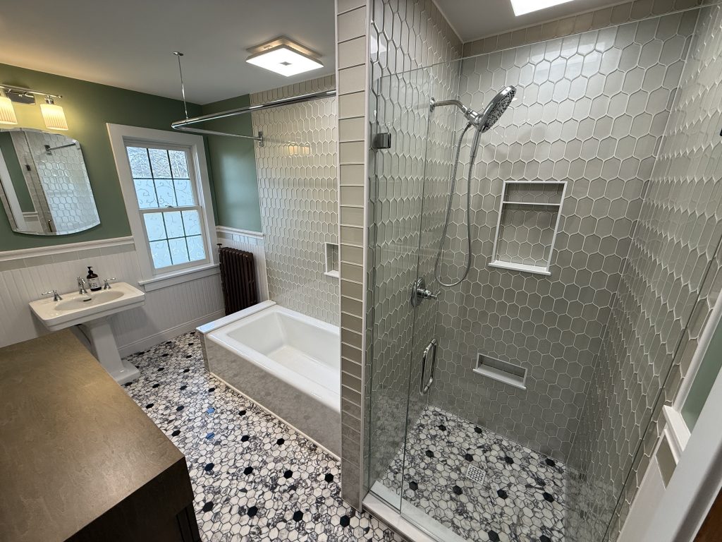 remodeled bathroom with custom tile and modern finishes in Northwest Ohio